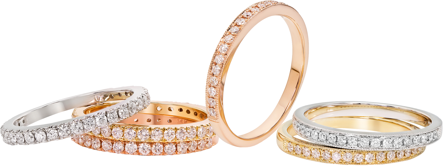 Stackable diamond bands in yellow, white and rose gold for wedding and anniversary or engagement bridal sets.