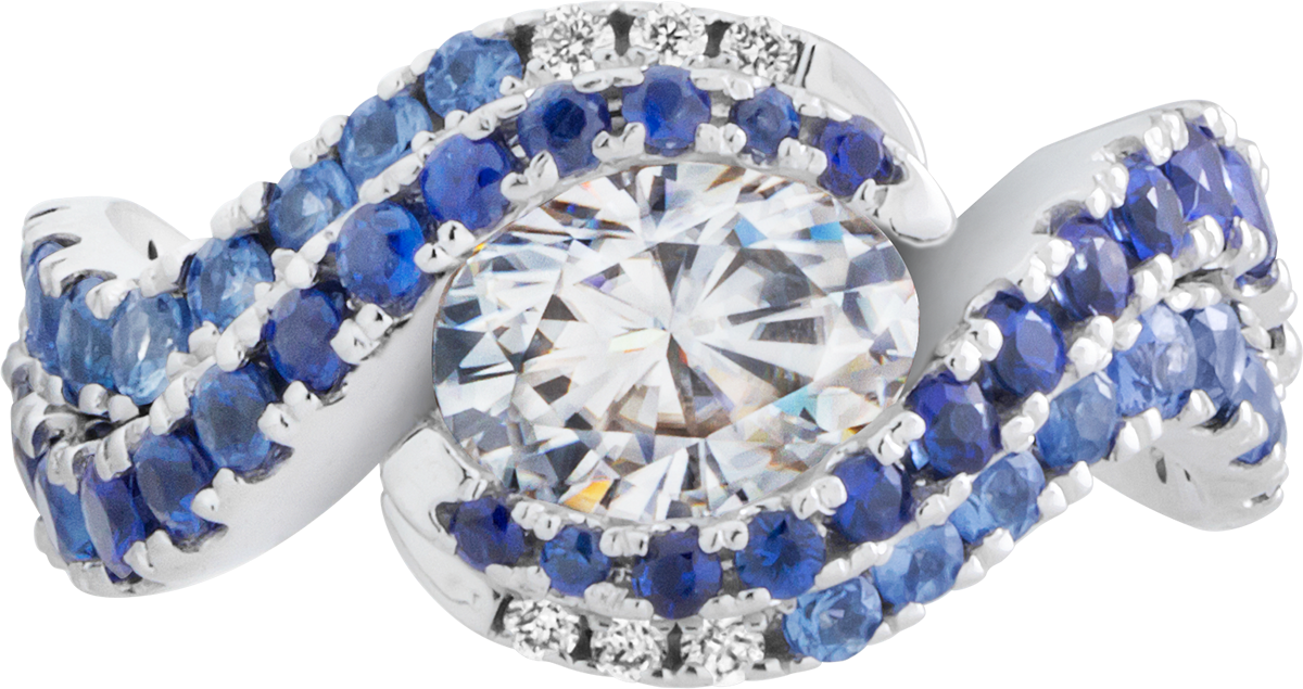 Custom diamond engagement ring design with sapphire accents and matching wedding band. Custom designed by Ron George Jewelers in Annapolis, MD.