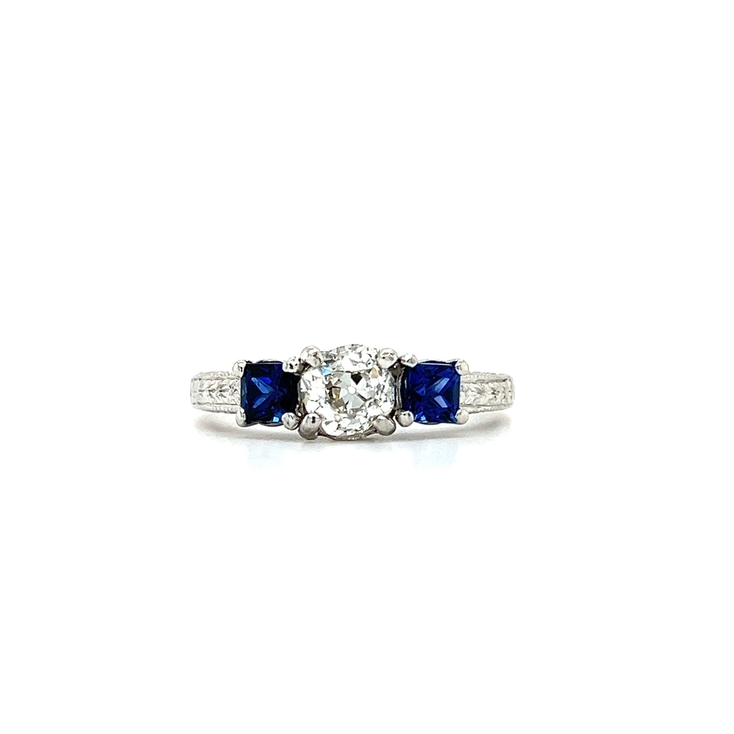 Old Mine Brilliant Diamond Ring with Two Ceylon Sapphires in Platinum. Front View.