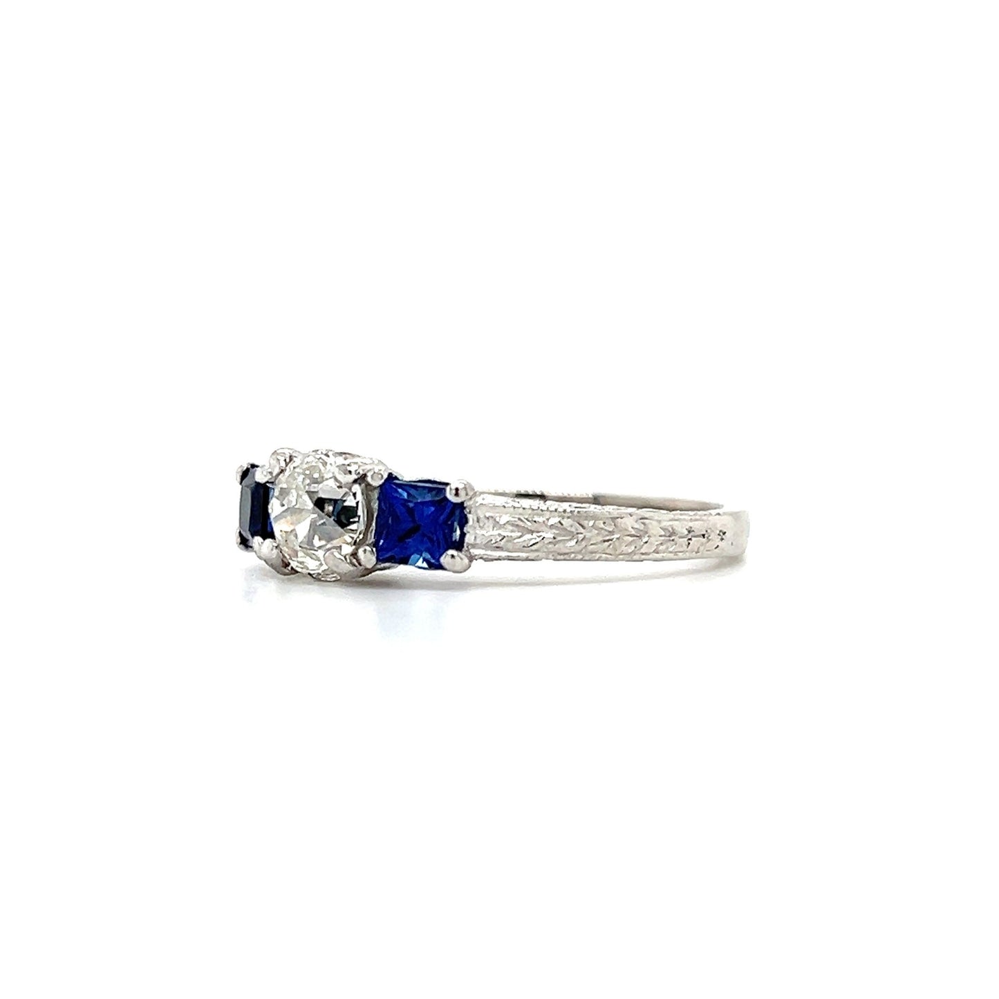 Old Mine Brilliant Diamond Ring with Two Ceylon Sapphires in Platinum. Right Side View.