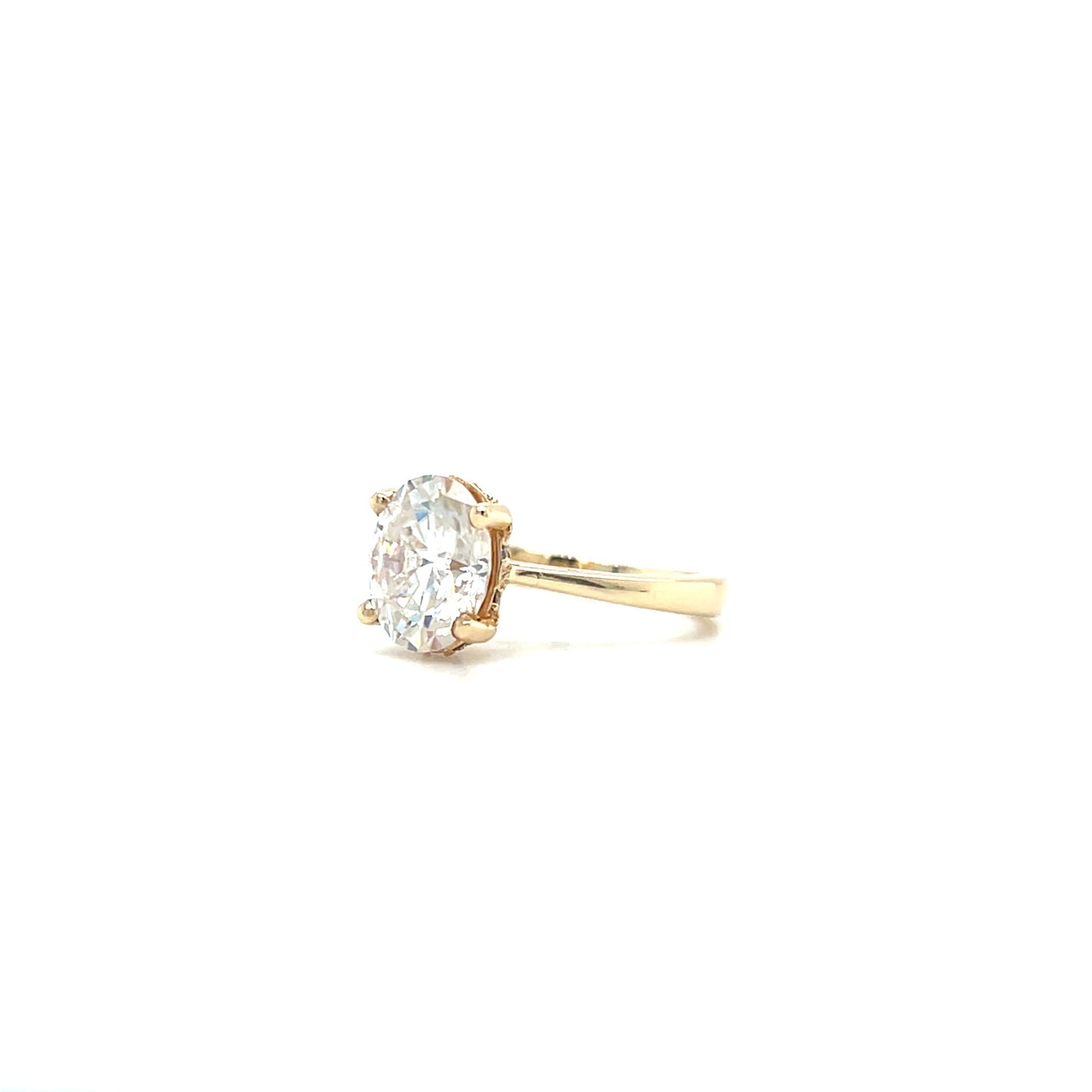 Oval Moissanite Ring with Hidden Halo in 14K Yellow Gold. Right Side View.
