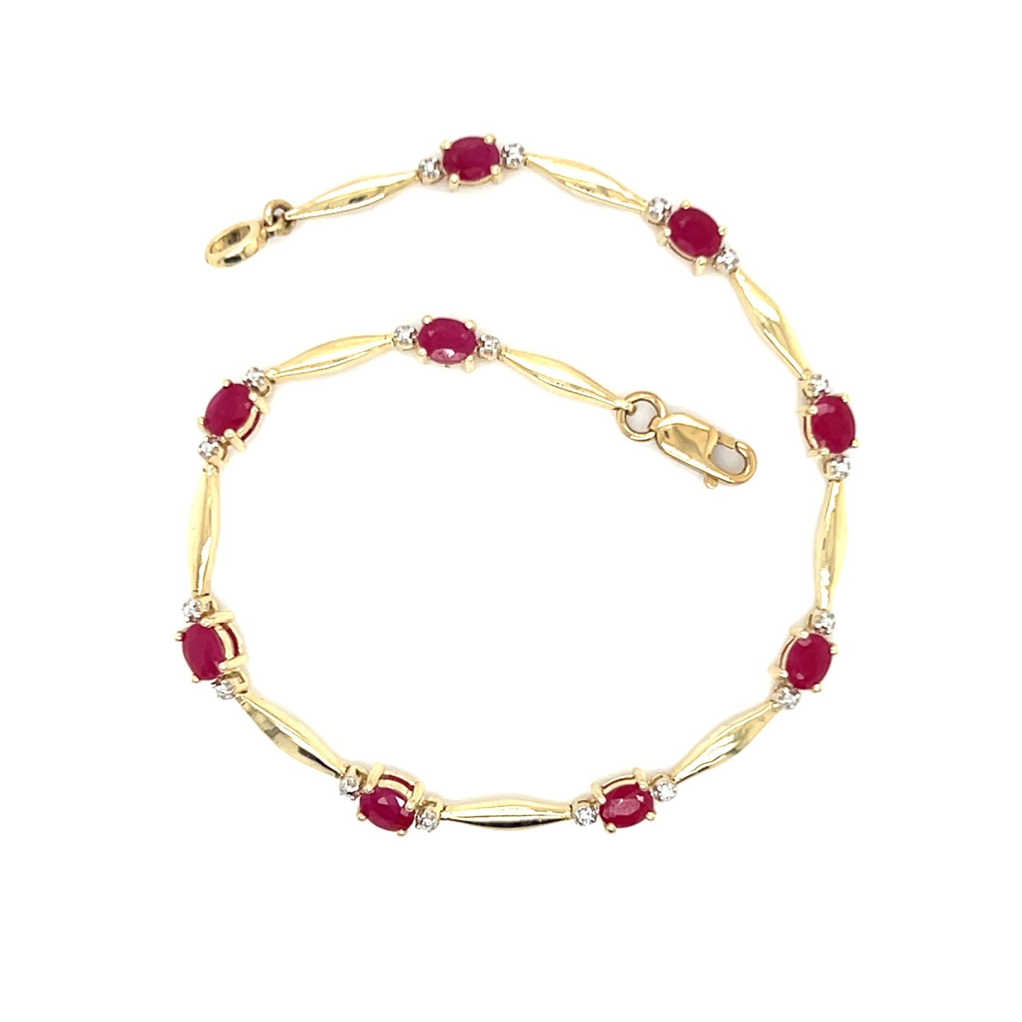 Ruby Bracelet with Diamond Accents in 10K Yellow Gold.