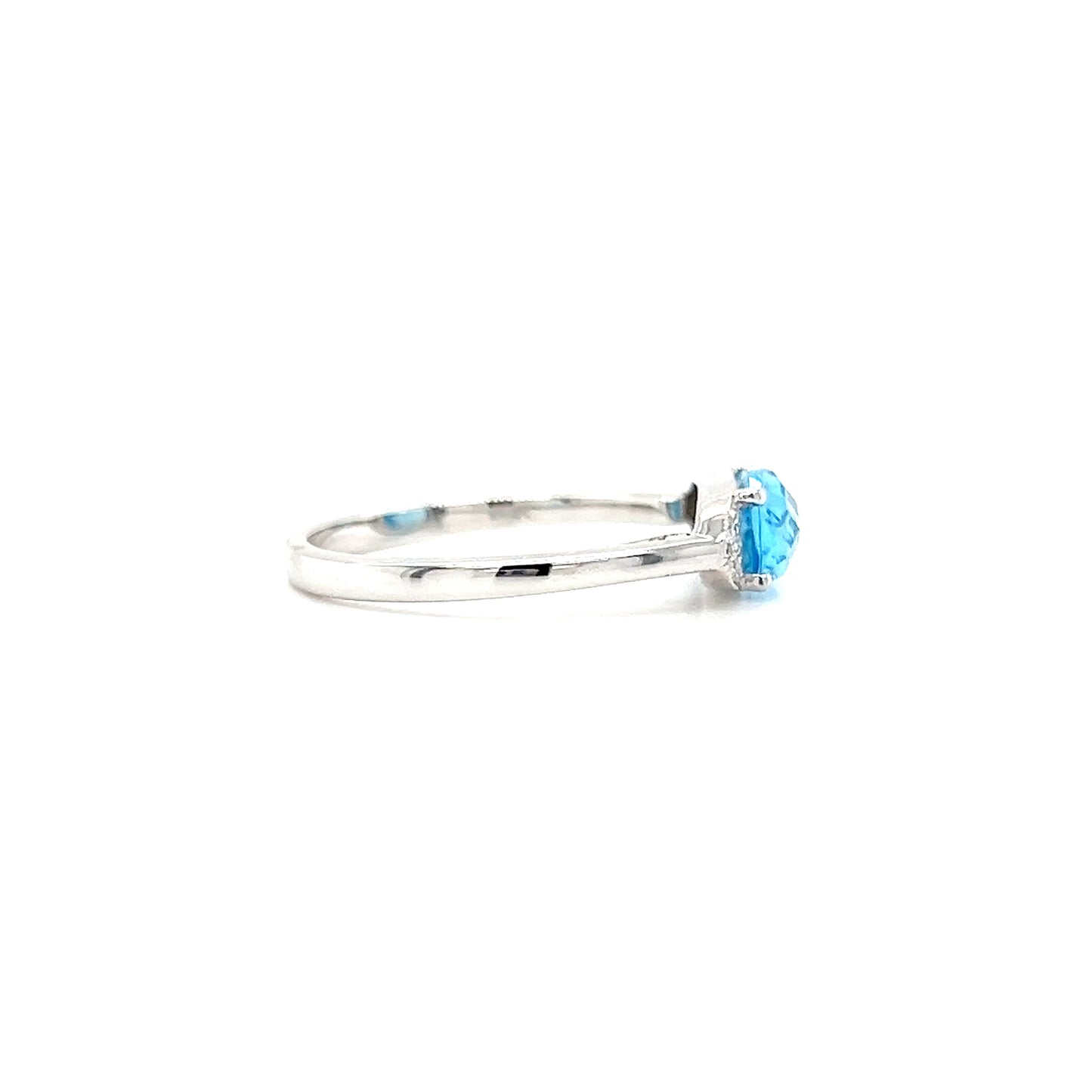 Elongated Blue Topaz Ring with Side Diamonds in 14K White Gold Left Profile