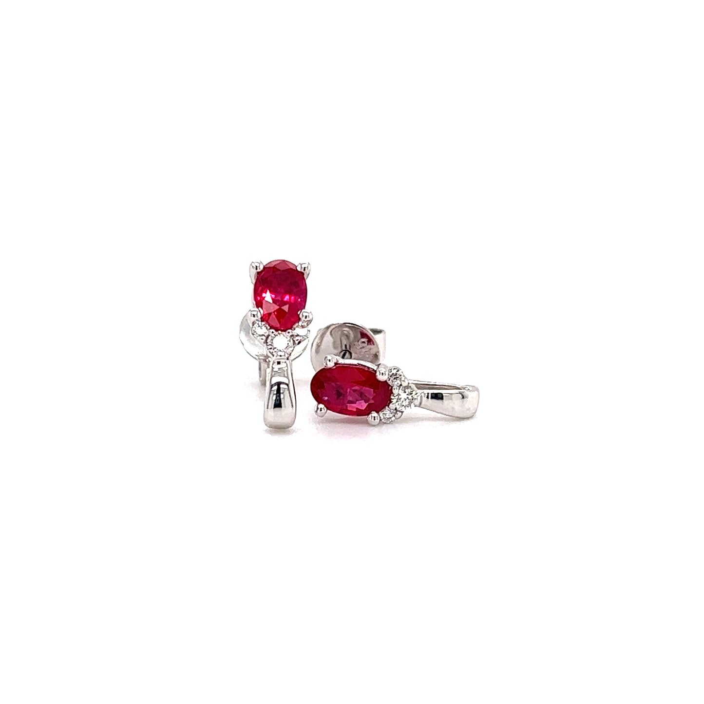 Oval Ruby Stud Earrings with Side Diamonds in 14K White Gold Front and Side View