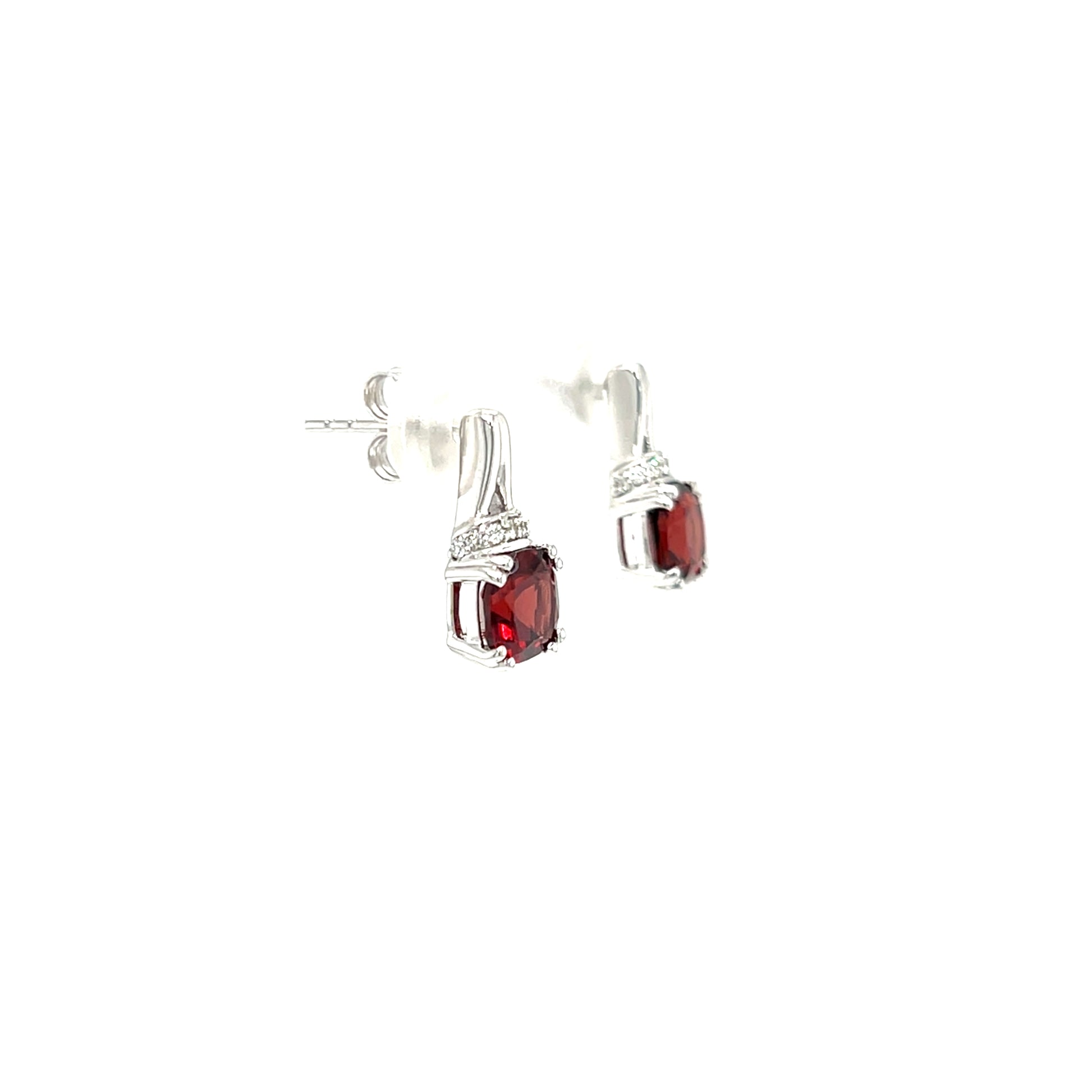 Cushion Garnet Post Earrings with Accent Diamonds in 10K White Gold. Left Side View.