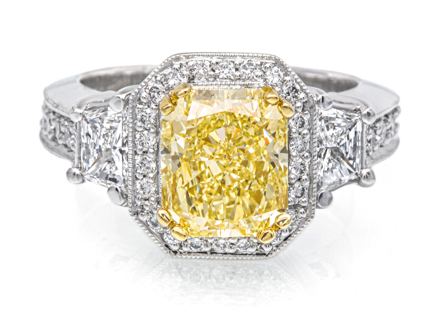 Custom canary diamond ring design by Ron George.