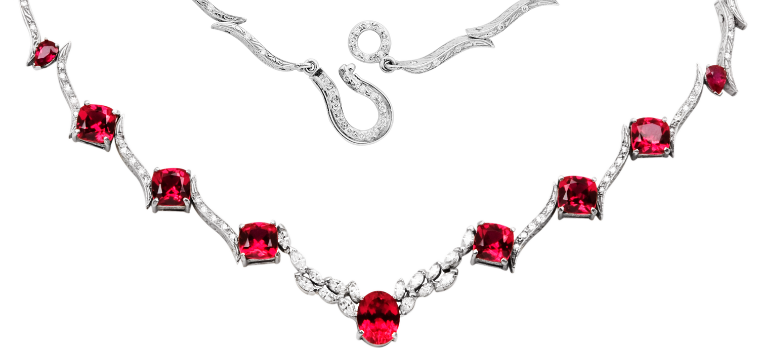 Custom engraved link necklace with multiple red gemstones and custom designed catch by Ron George.