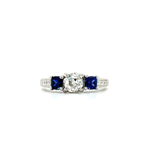 Old Mine Brilliant Diamond Ring with Two Ceylon Sapphires in Platinum. Front View.