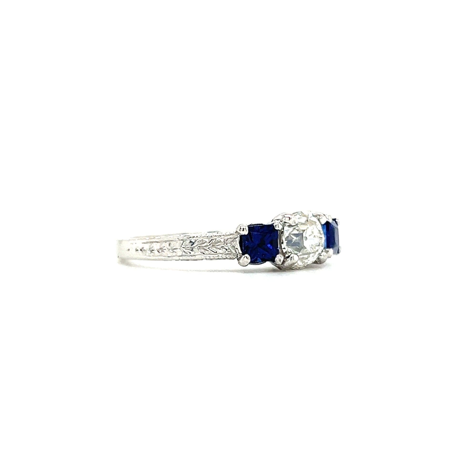 Old Mine Brilliant Diamond Ring with Two Ceylon Sapphires in Platinum. Left Side View.