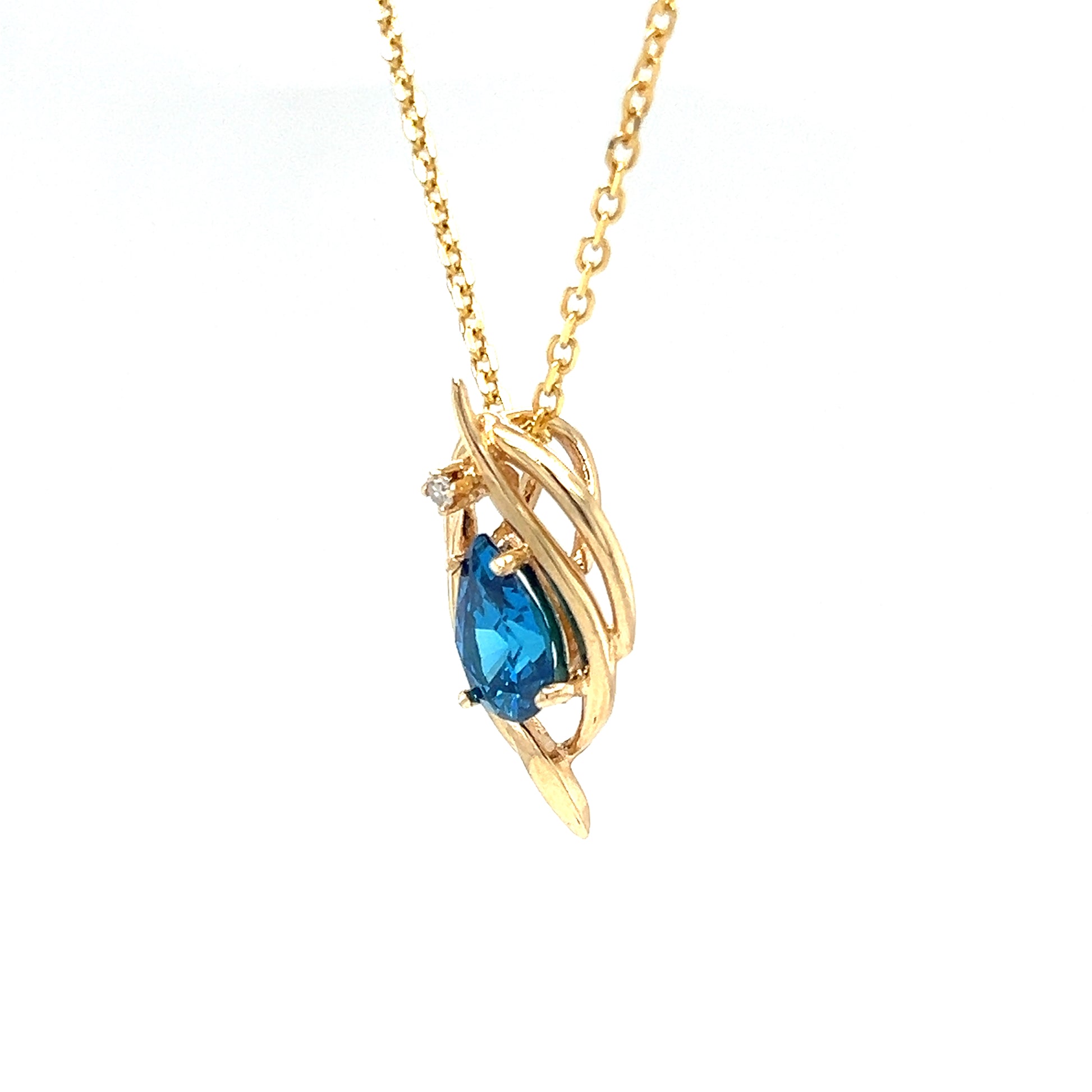 Pear Blue Topaz Slide Pendant with Diamond Accent in 14K Yellow Gold. Pendant and Chain Right Side View.