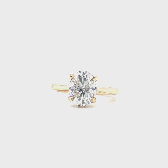 Oval Moissanite Ring with Hidden Halo in 14K Yellow Gold. Video