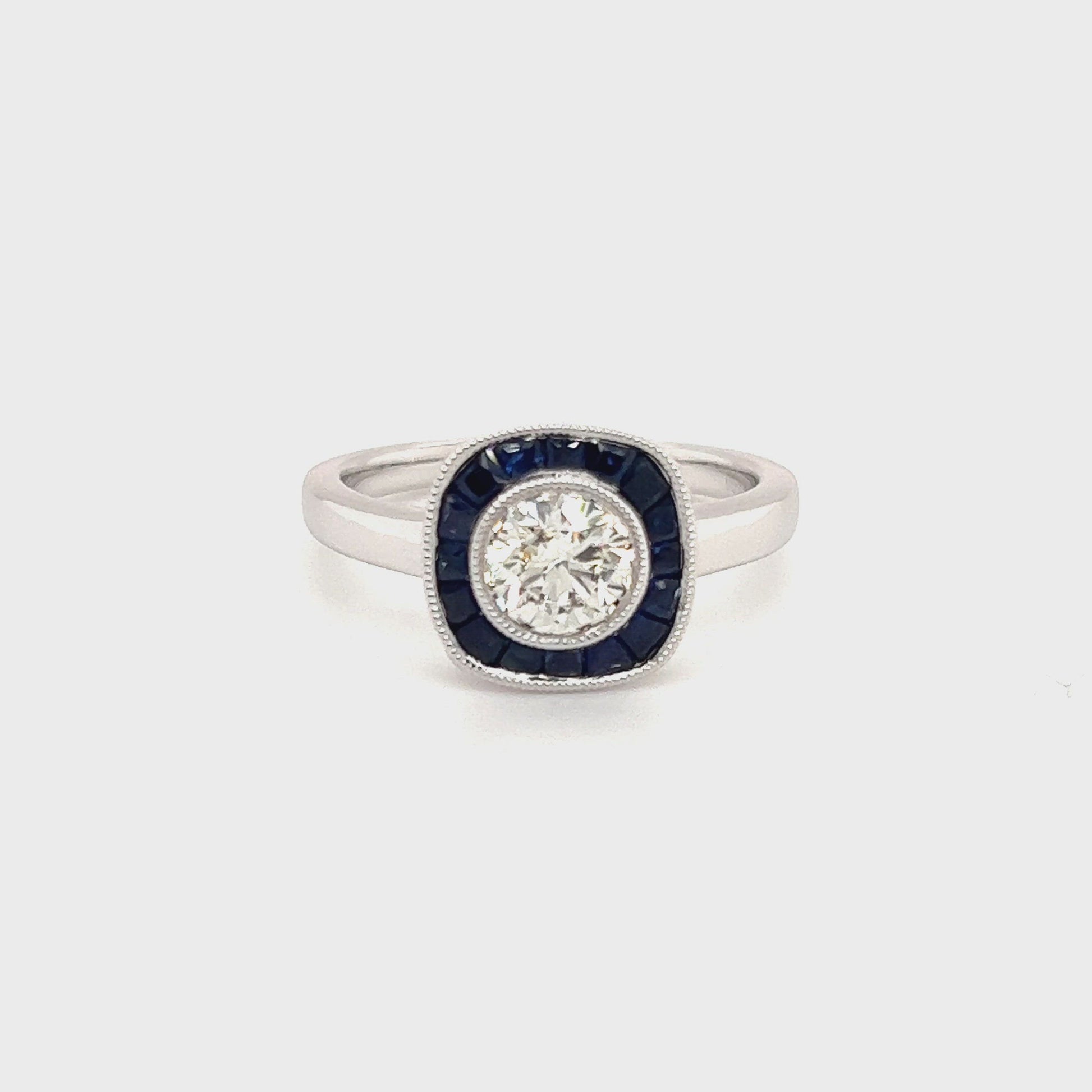 Brilliant Diamond Ring with Sapphire Halo in 18K White Gold Video 90