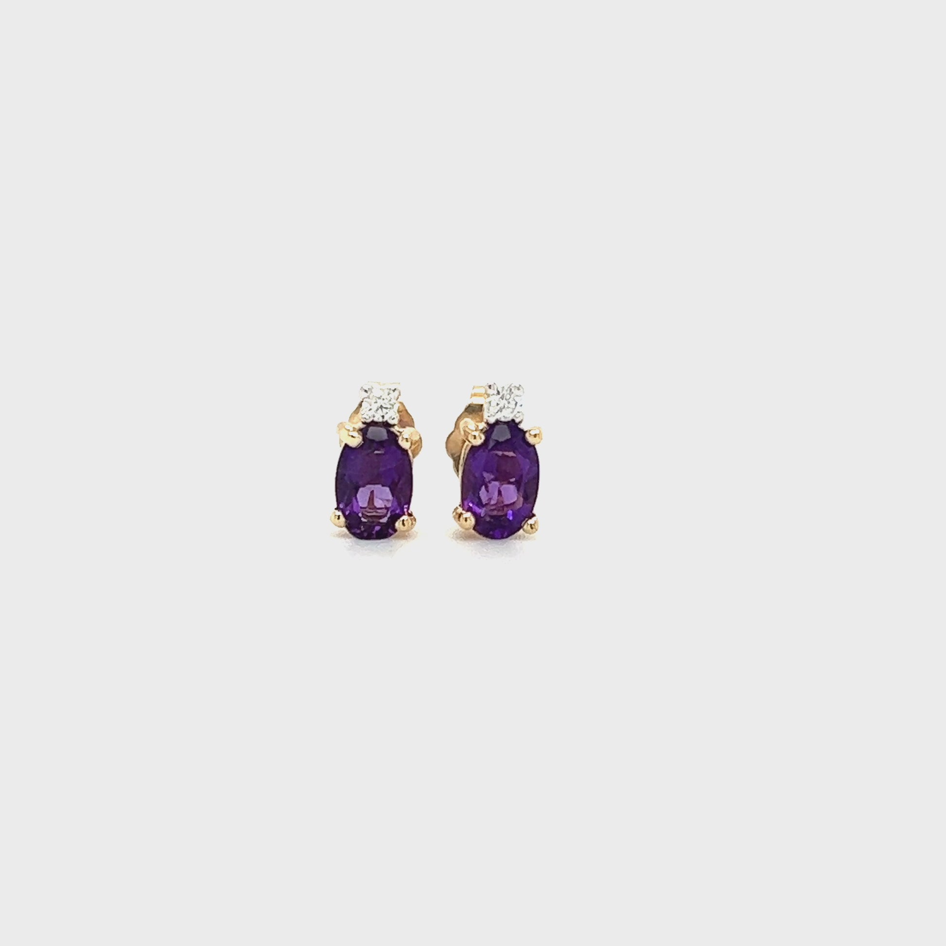 Oval Amethyst Stud Earrings with Accent Diamonds in 14K Yellow Gold Video