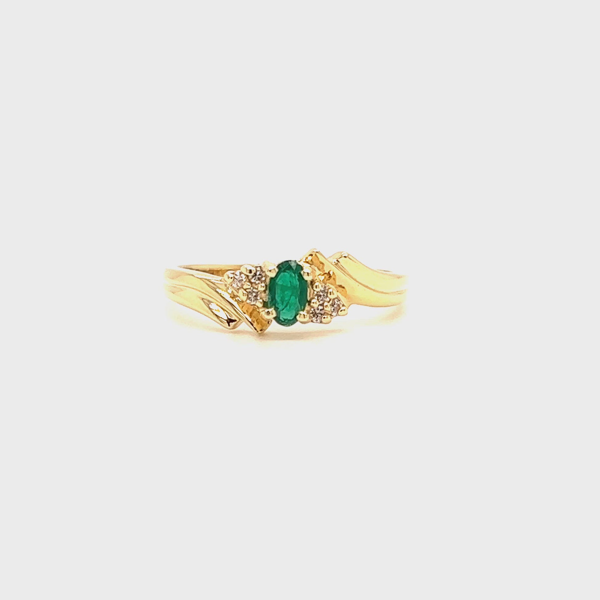 Bypass Emerald Ring with Six Side Diamonds in 14K Yellow Gold Video