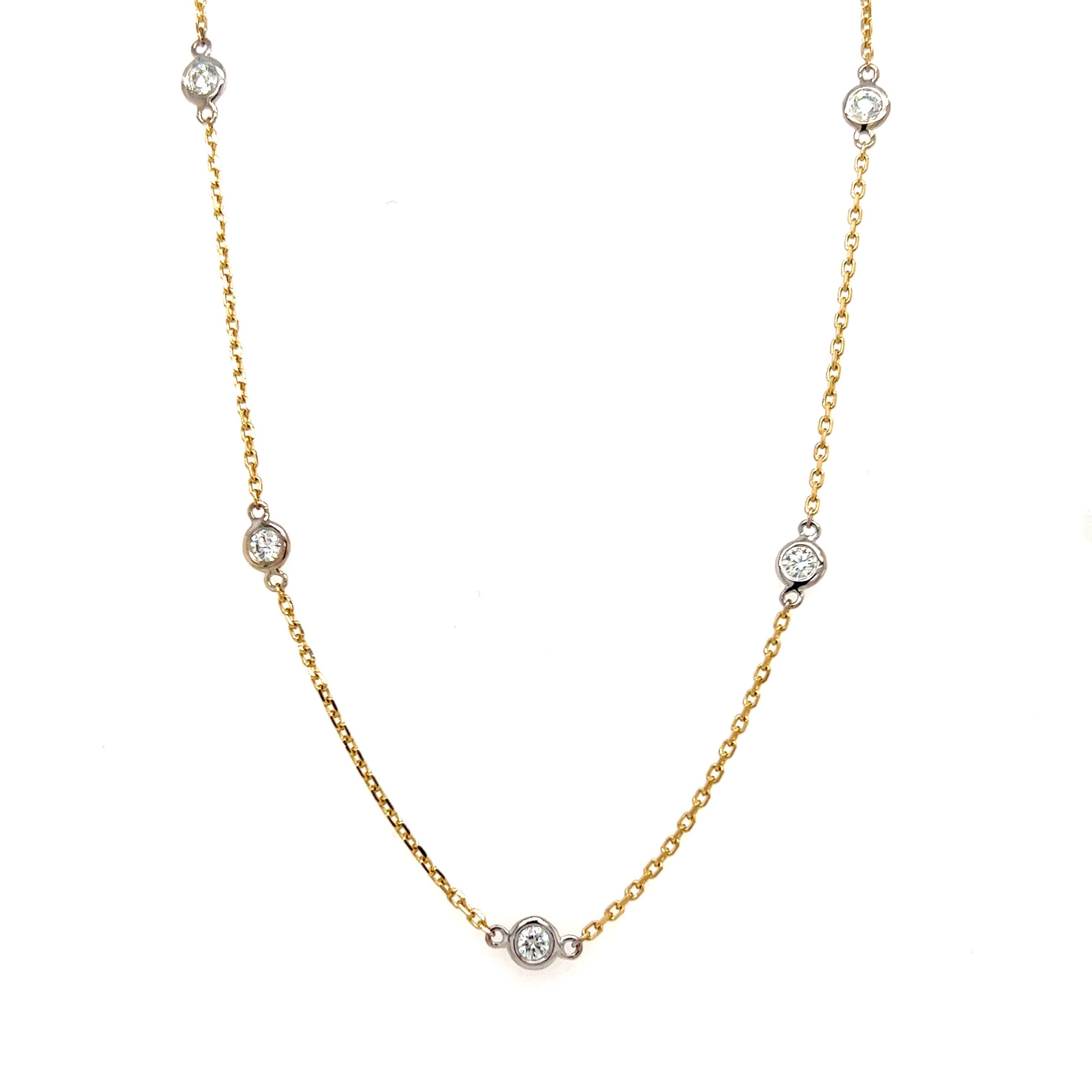 Gold and diamond store station necklace