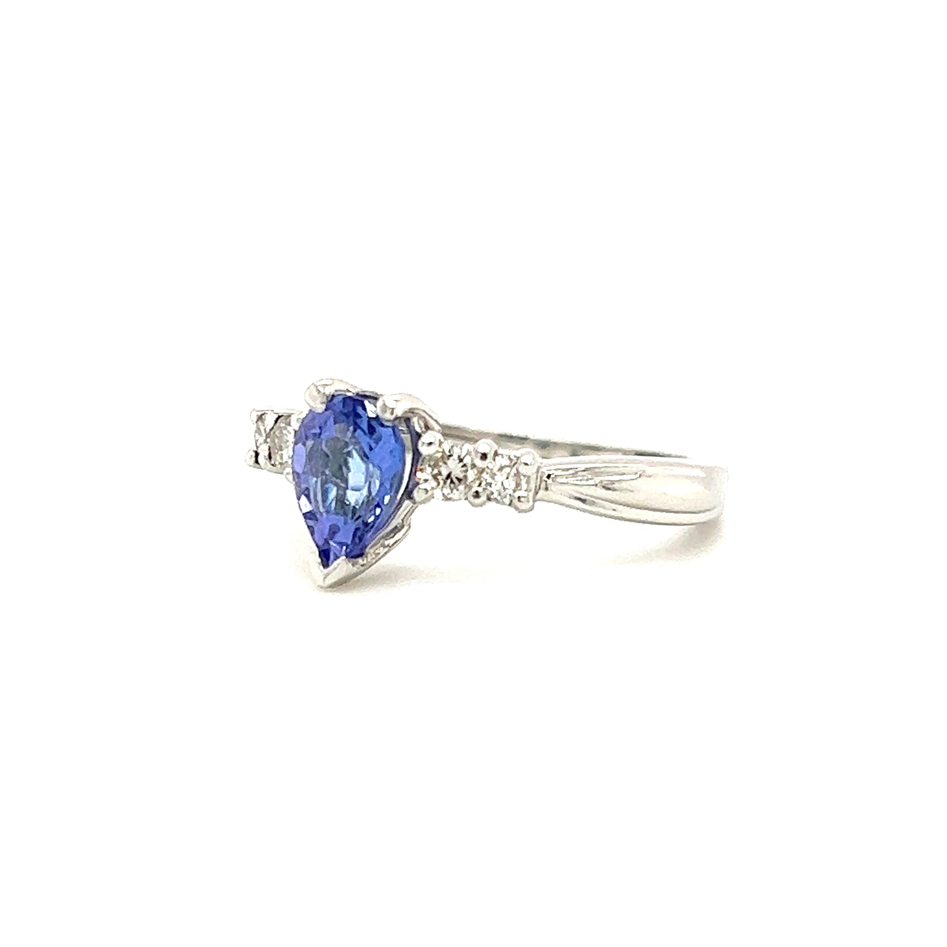 Pear Tanzanite Ring with Four Side Diamonds in Platinum Left Side View