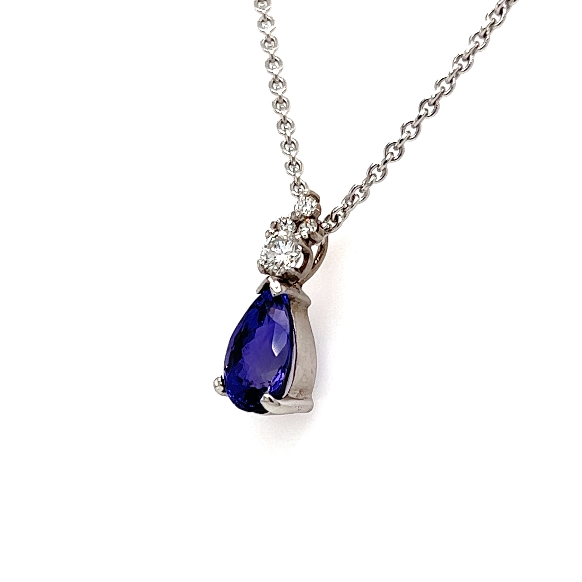 Pear Tanzanite Pendant with Four Diamonds in Platinum and 14K White Gold Pendant and Chain Left Side View