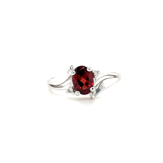 Bypass Oval Garnet Ring with Two Side Diamonds in 14K White Gold Front View