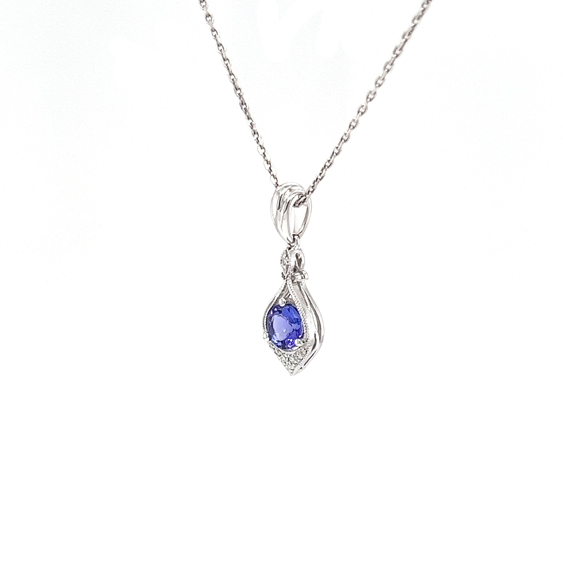 Tanzanite Pendant with Eight Diamonds in 14K White Gold Right Side View with Chain
