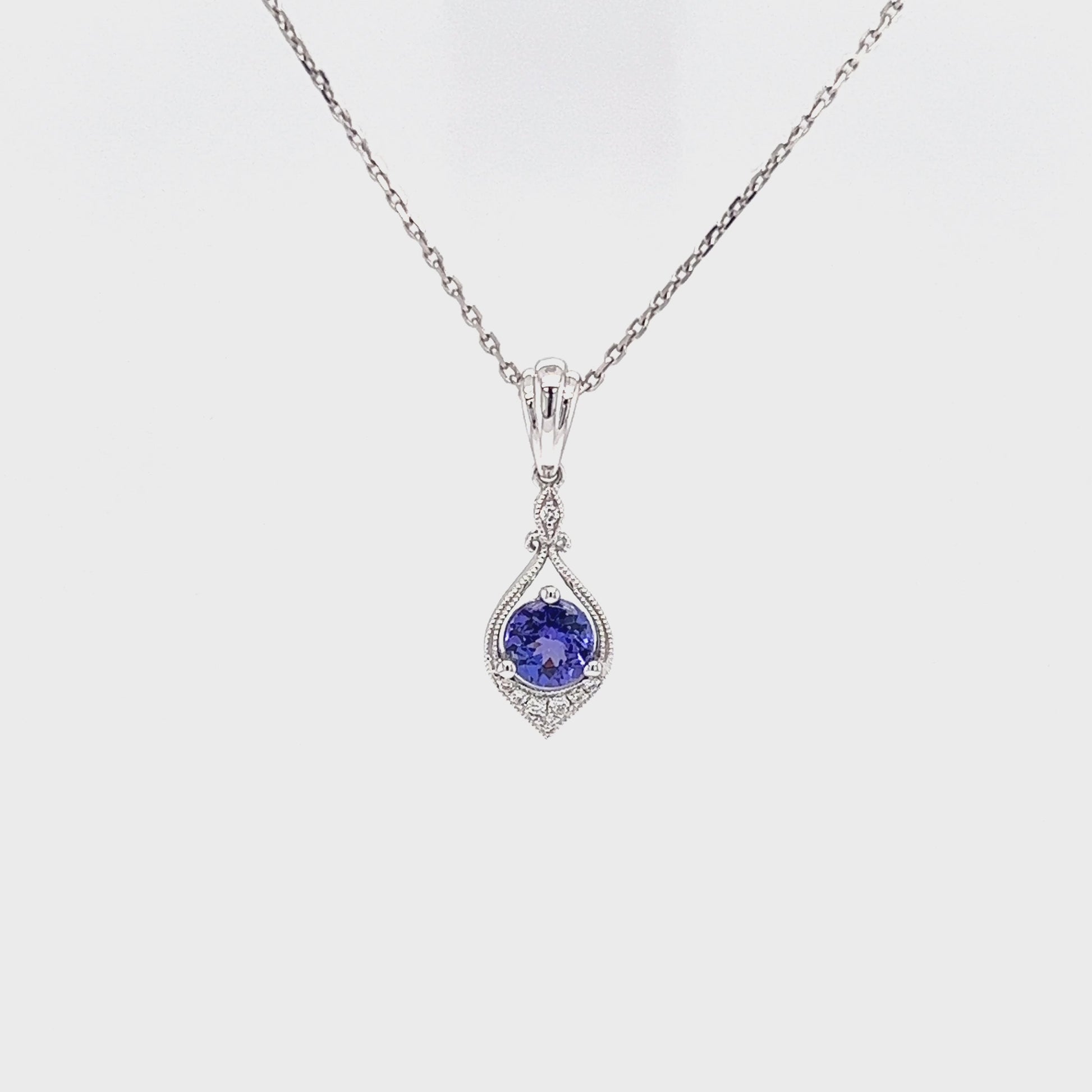 Tanzanite Pendant with Eight Diamonds in 14K White Gold Video with Chain