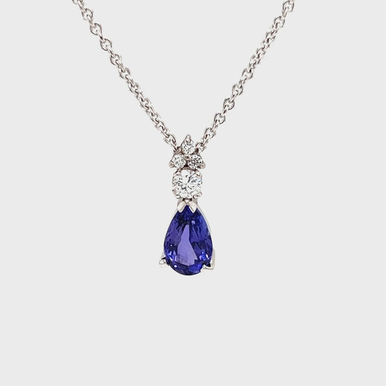 Pear Tanzanite Pendant with Four Diamonds in Platinum and 14K White Gold Video