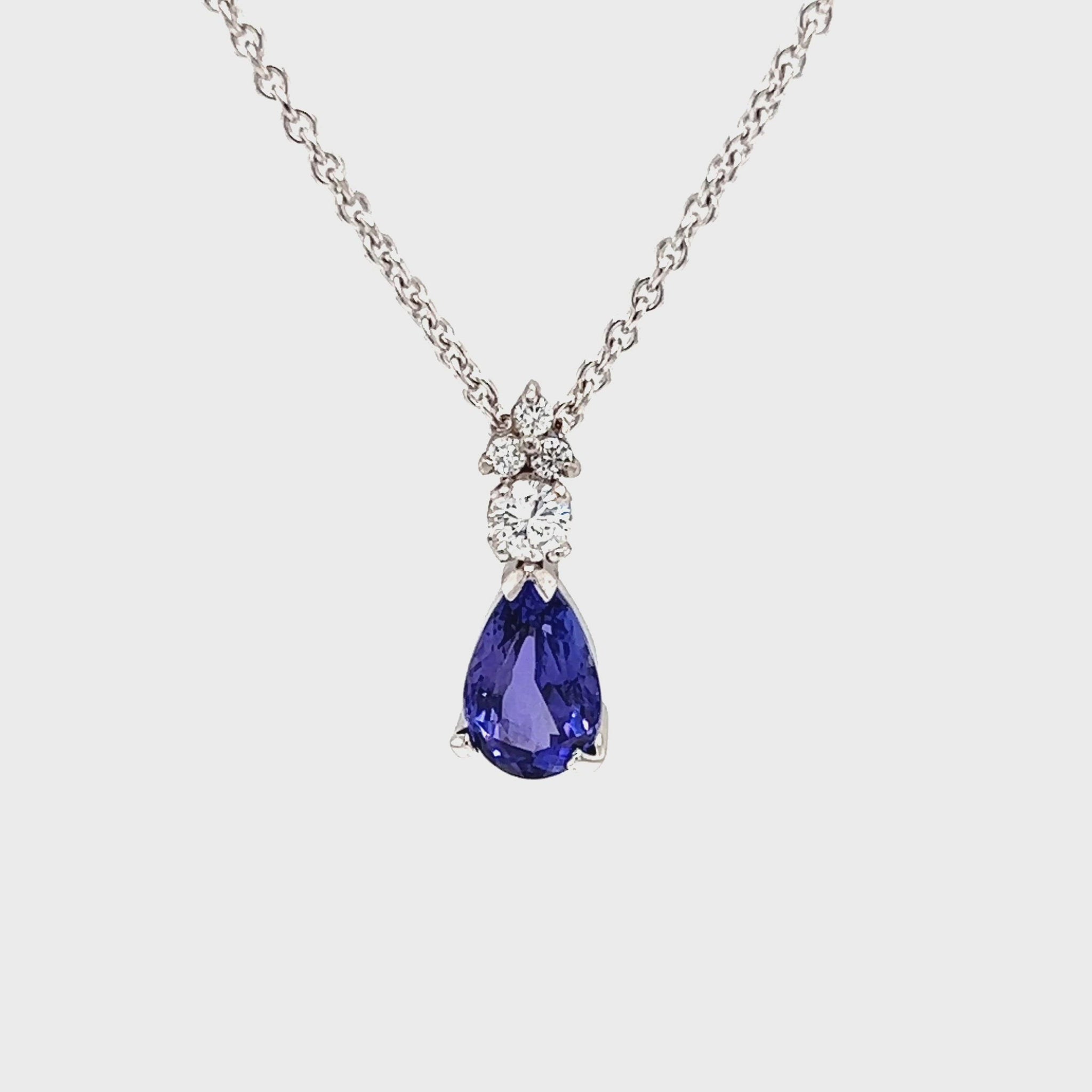 Pear Tanzanite Pendant with Four Diamonds in Platinum and 14K White Gold Video