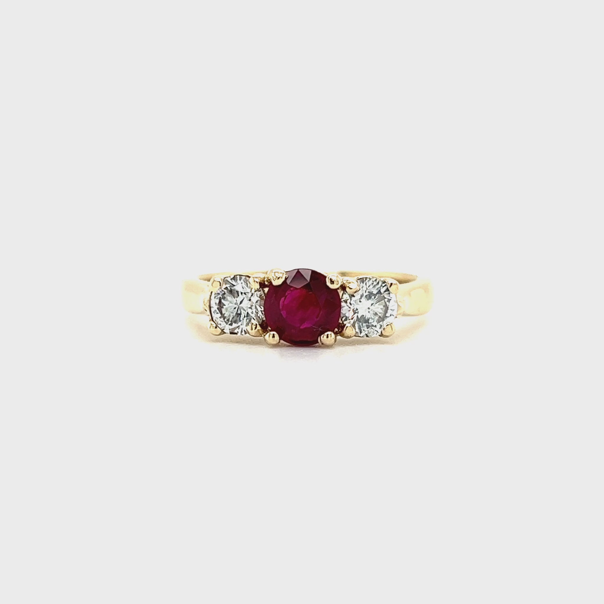 Round Ruby Ring with Two Side Diamonds in 14K Yellow Gold Video