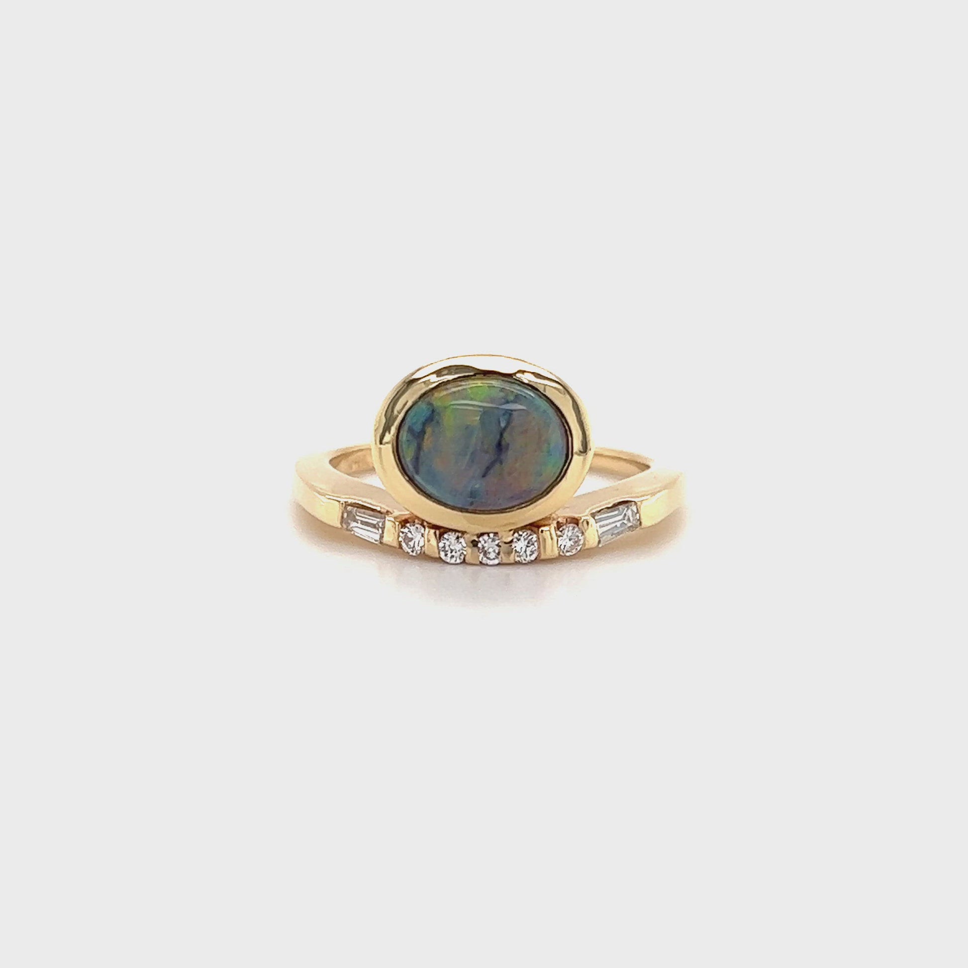 Black Opal Ring with Seven Side Diamonds in 14K Yellow Gold Video