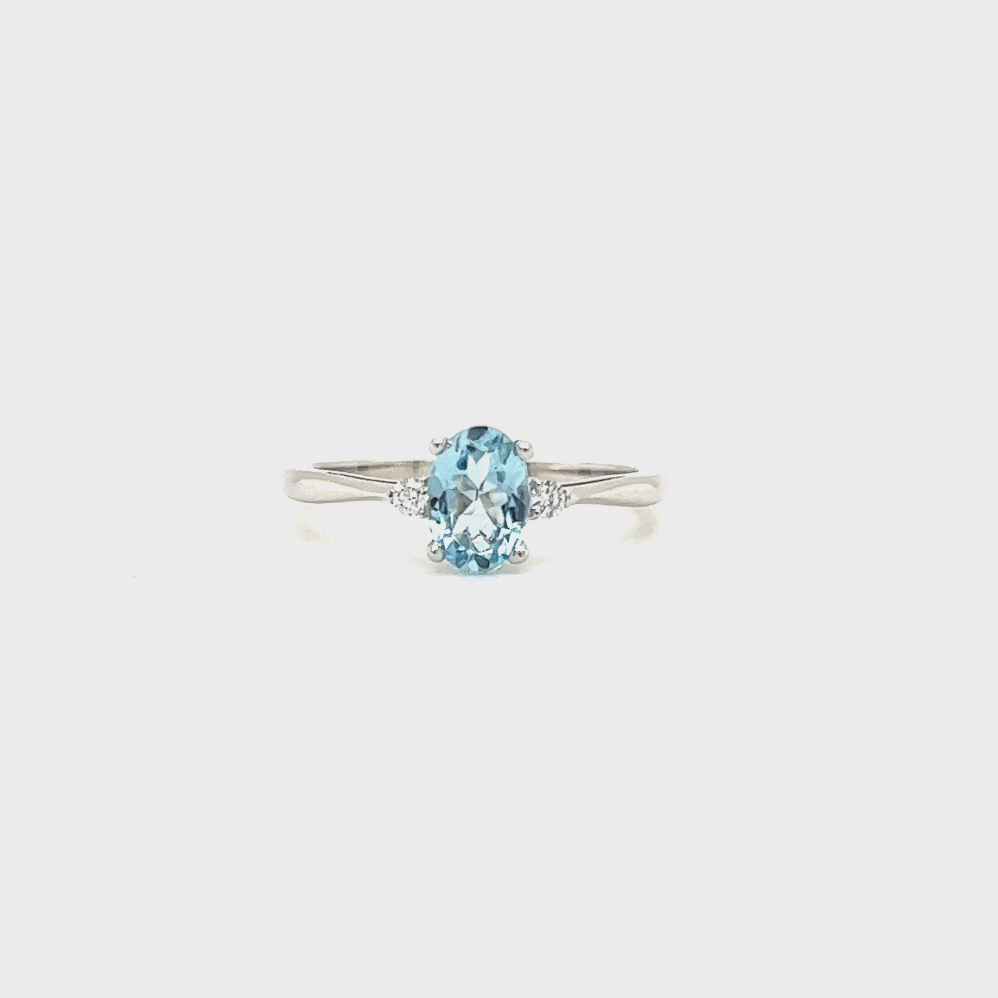 Oval Aquamarine Ring with Two Side Diamonds in 14K White Gold Video