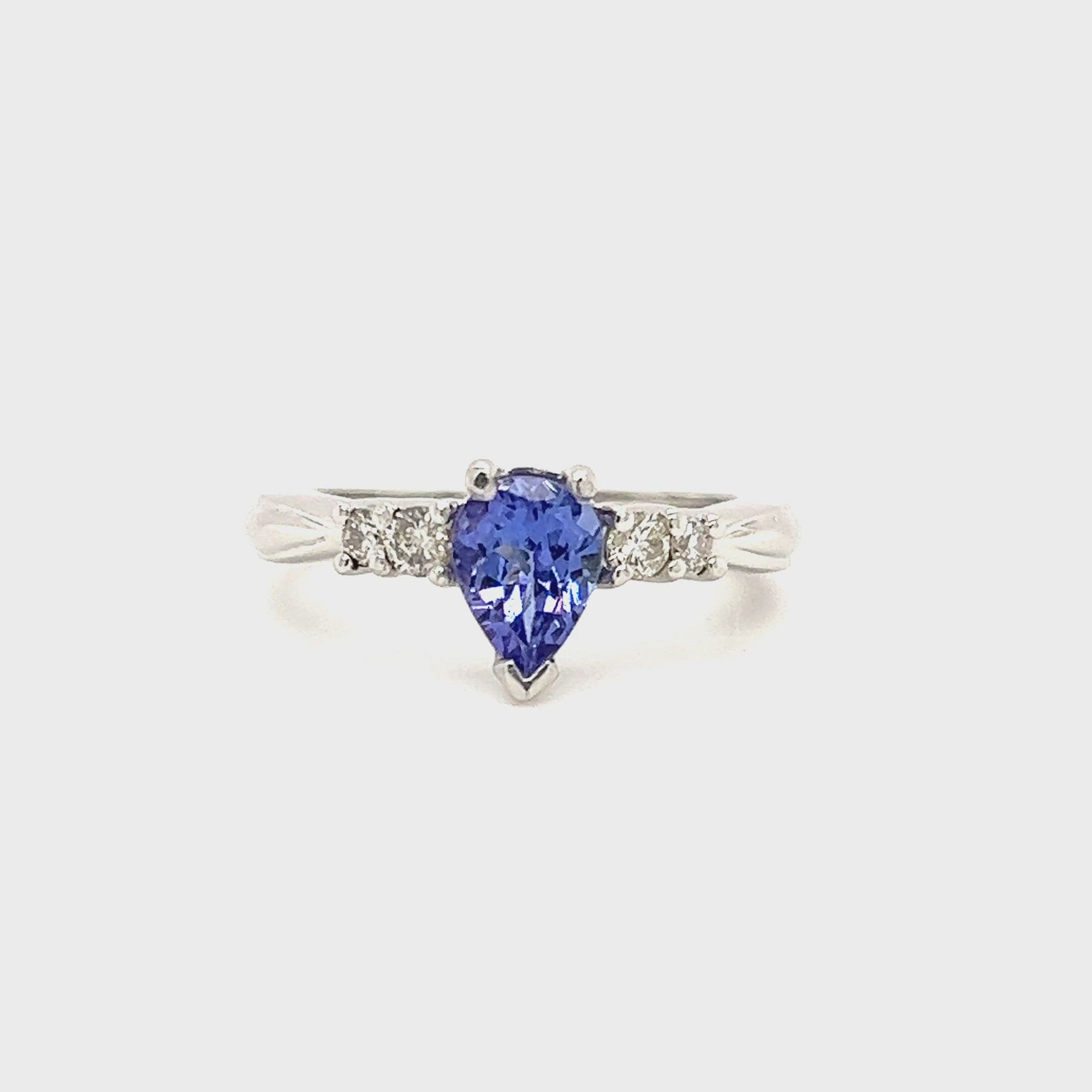 Pear Tanzanite Ring with Four Side Diamonds in Platinum Video