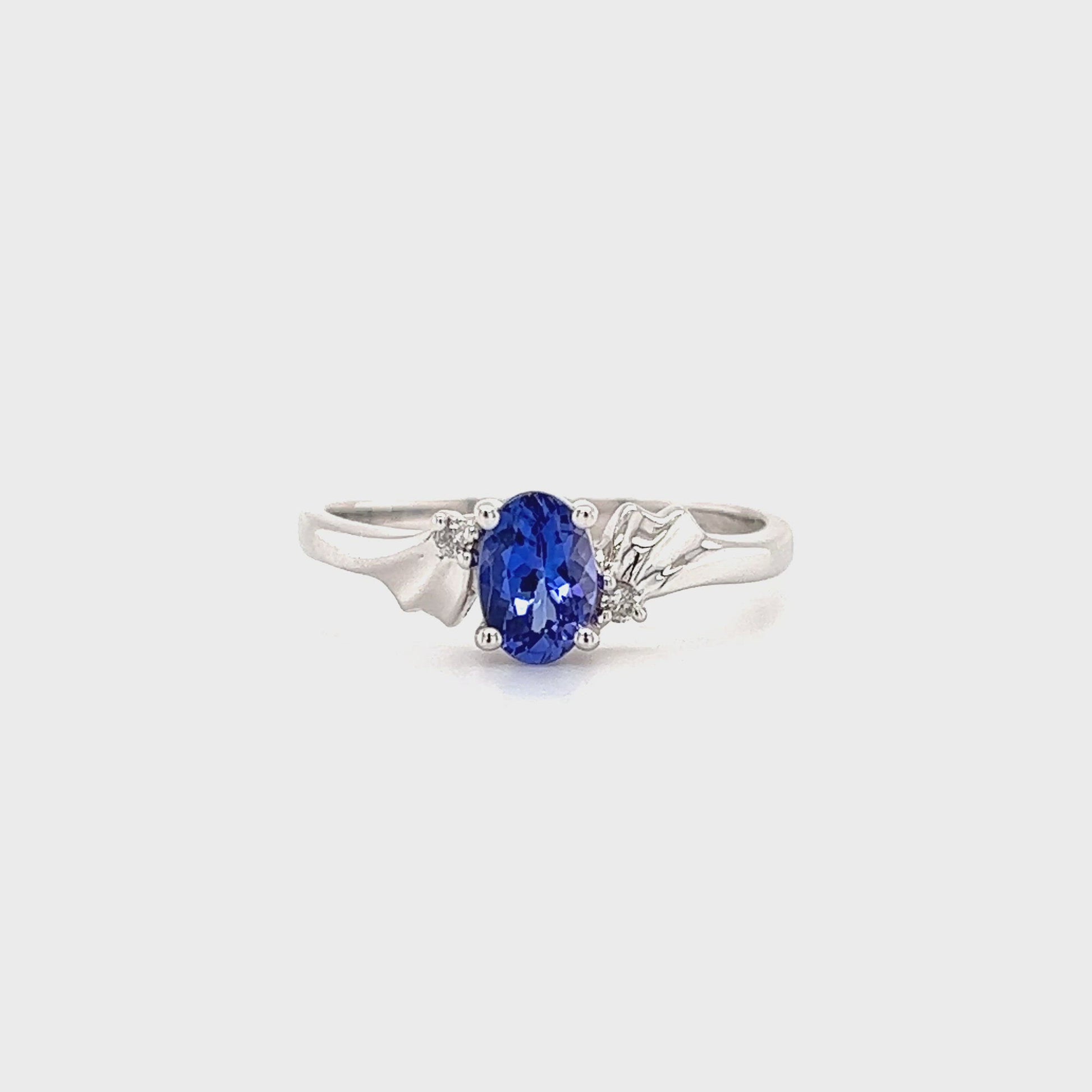 Oval Tanzanite Ring with Two Side Diamonds in 14K White Gold Video