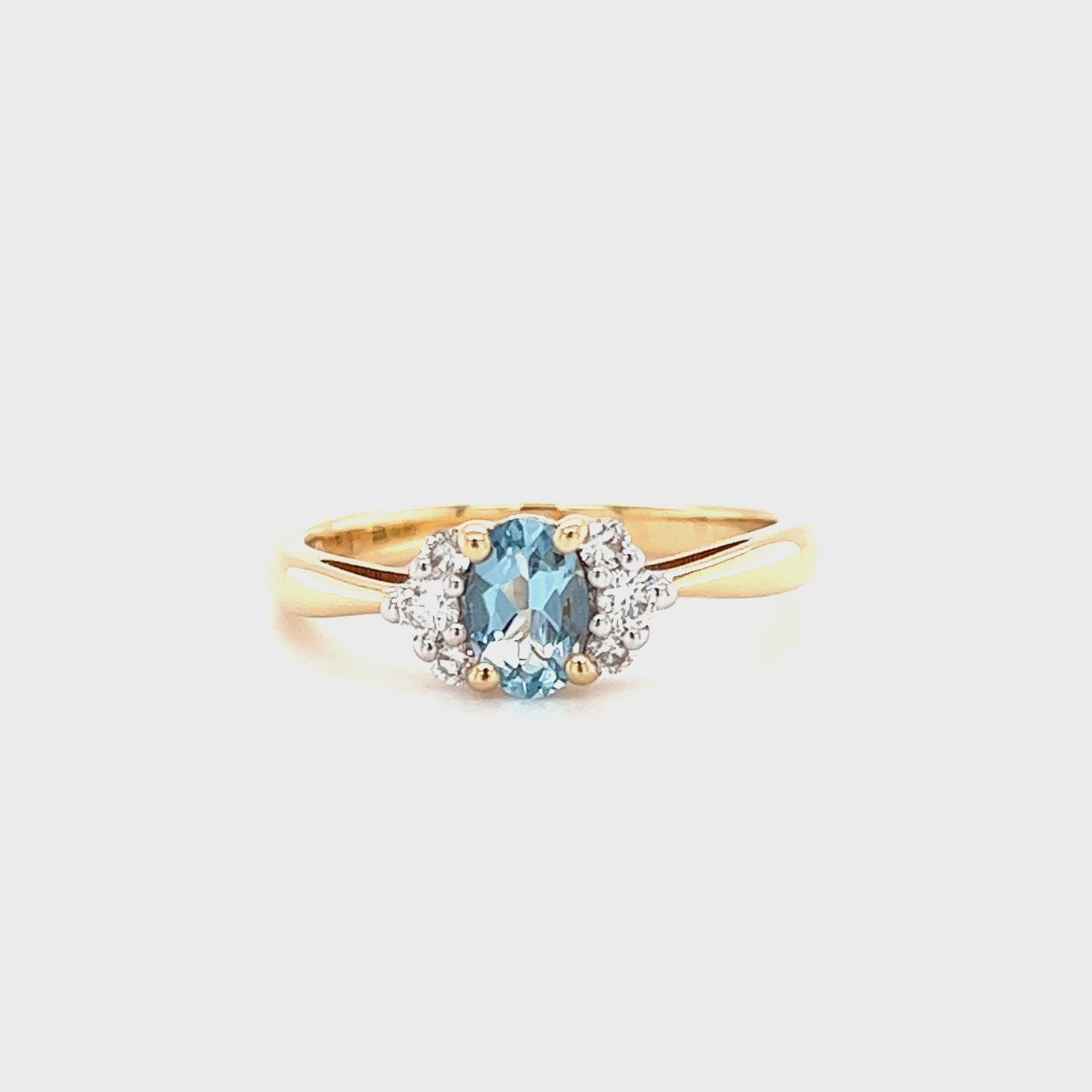 Oval Aquamarine Ring with Six Side Diamonds in 14K Yellow Gold Video