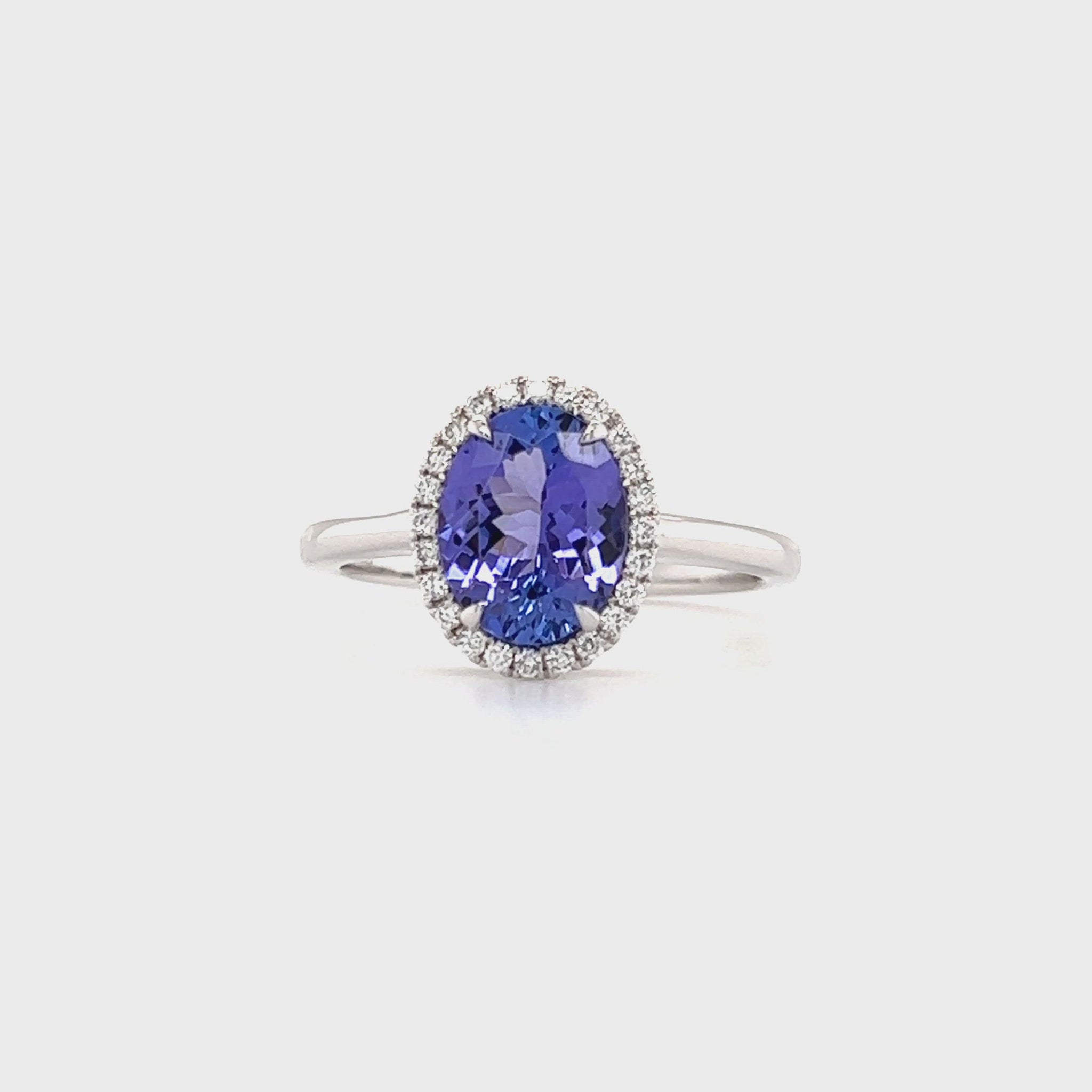Oval Tanzanite Ring with 1.75ctw of Tanzanite and Diamond Halo in 14K White Gold Video