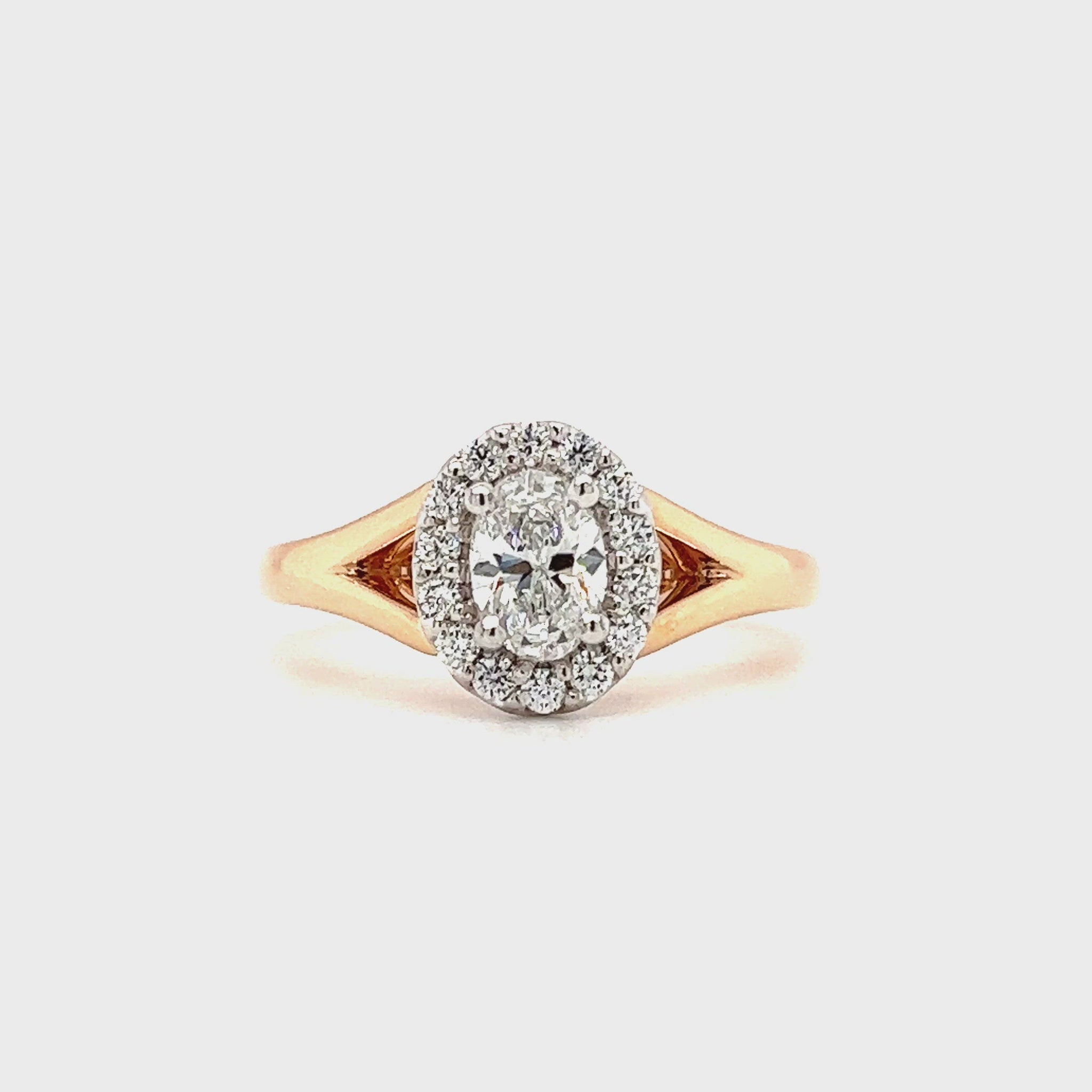 Oval Diamond Ring with Diamond Halo in 14K Rose Gold Left Side Video