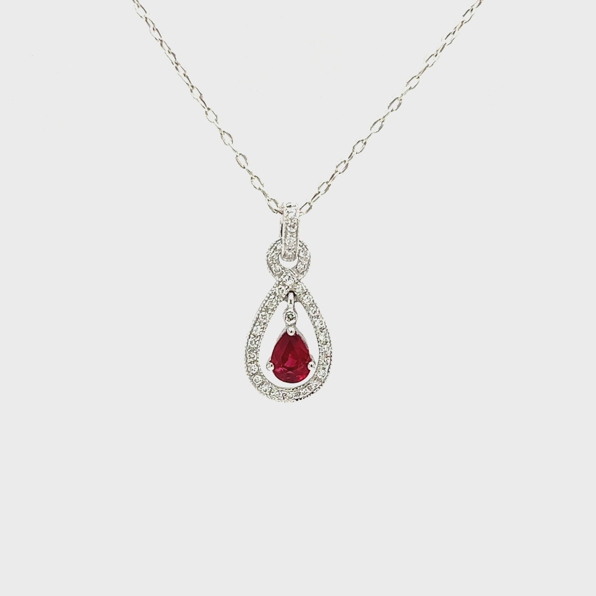 Dangling Pear Ruby Pendant with Diamond Accents in 14K White Gold Pendant and Chain Video