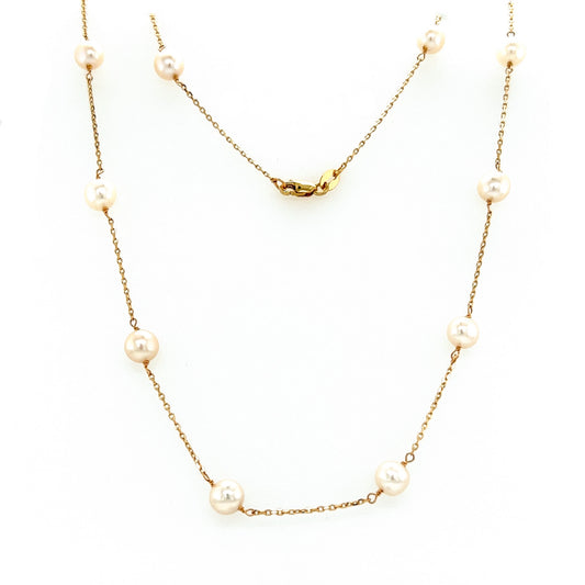 Freshwater Pearl Station Necklace with Fourteen Pearls in 14K Yellow Gold Full Necklace Front View