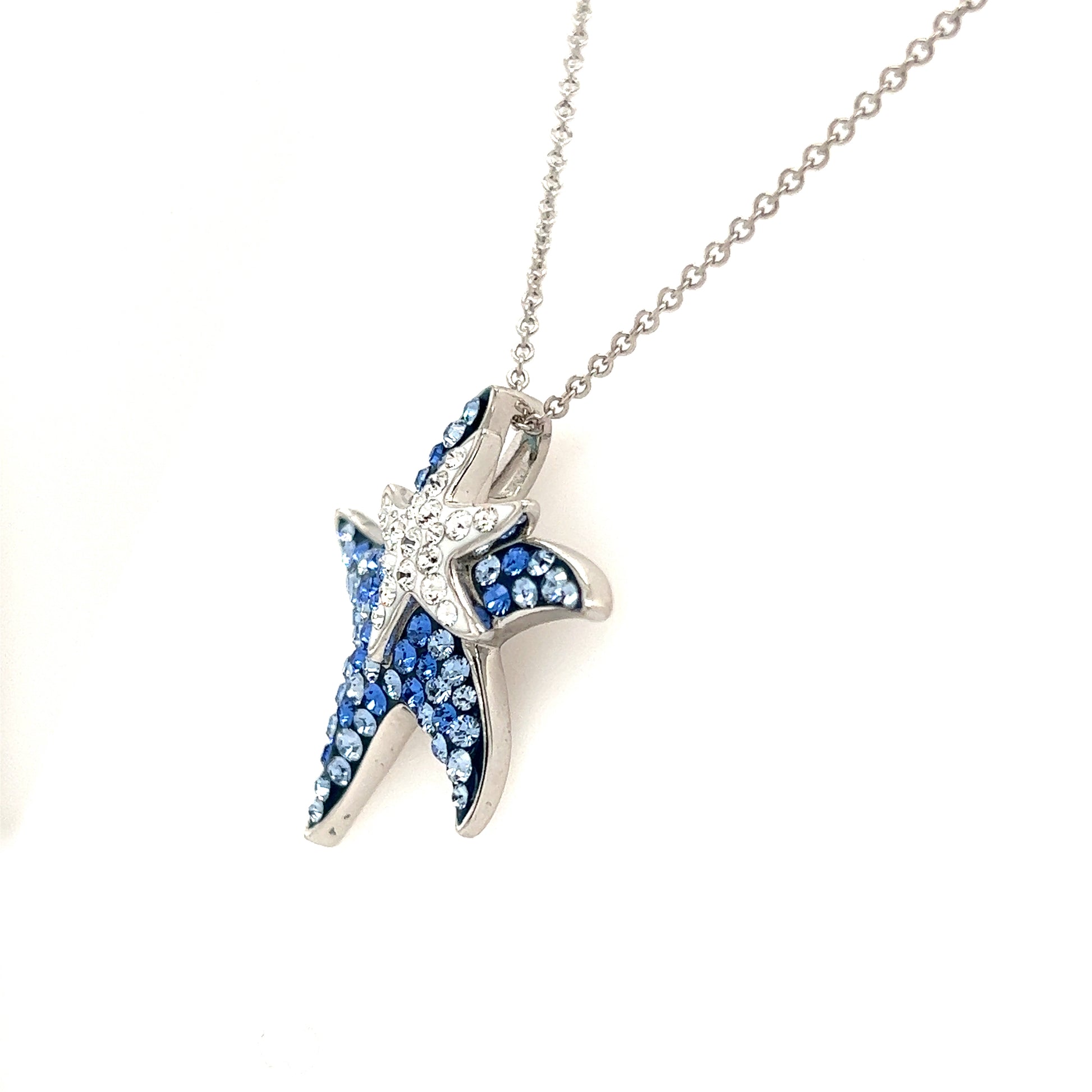 Blue Starfish Necklace with White and Blue Crystals in Sterling Silver. Left Side View