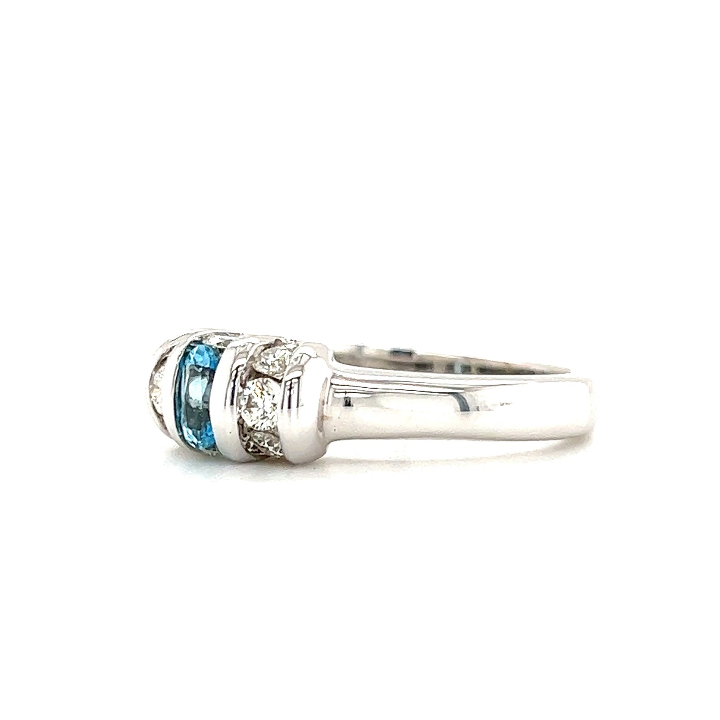 Oval Blue Topaz Ring with Side Diamonds in 14K White Gold Left Side View