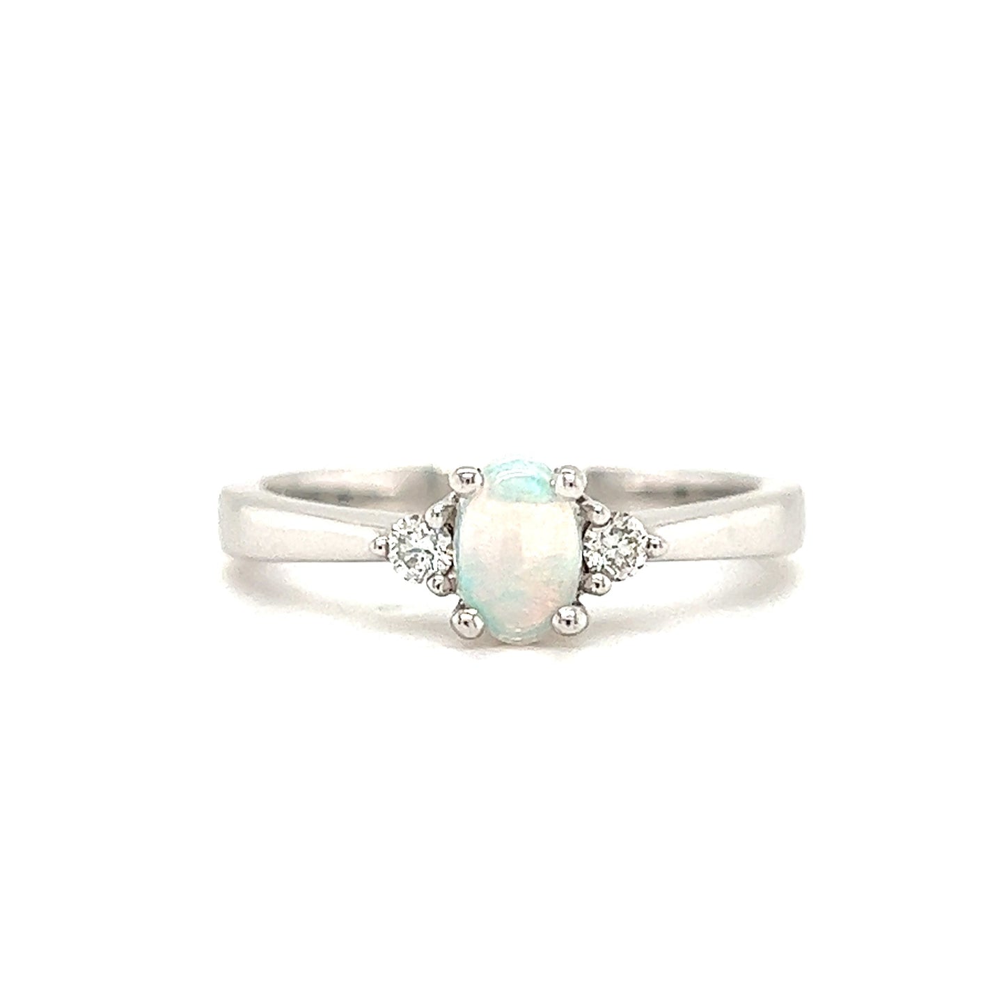 Oval Opal Ring with Two Side Diamonds in 14K White Gold Front View