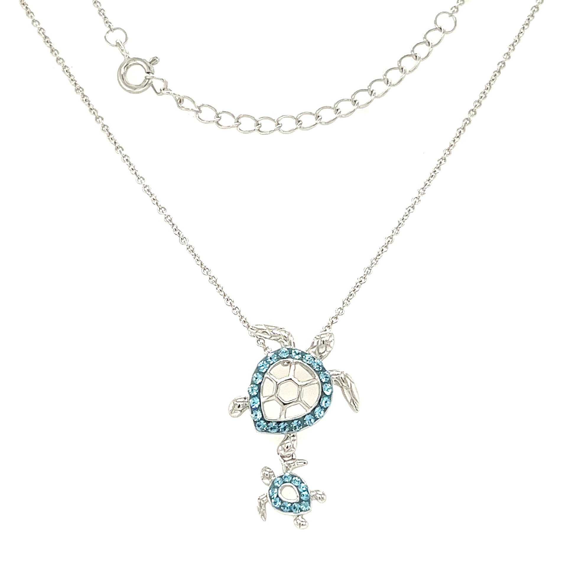 Mother and Baby Sea Turtle Necklace with Aqua Crystals in Sterling Silver Front View