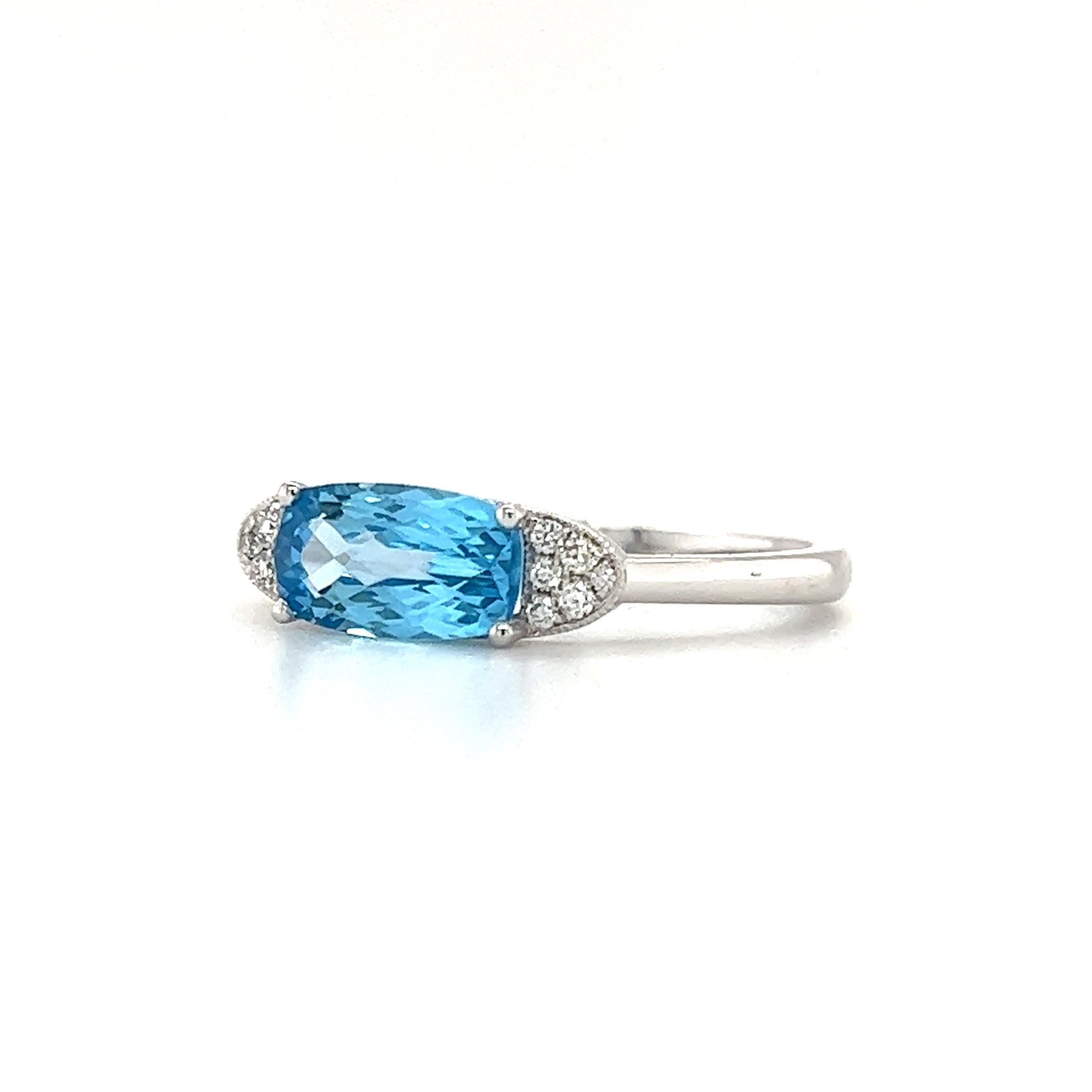 Elongated Blue Topaz Ring with Side Diamonds in 14K White Gold Left Side View